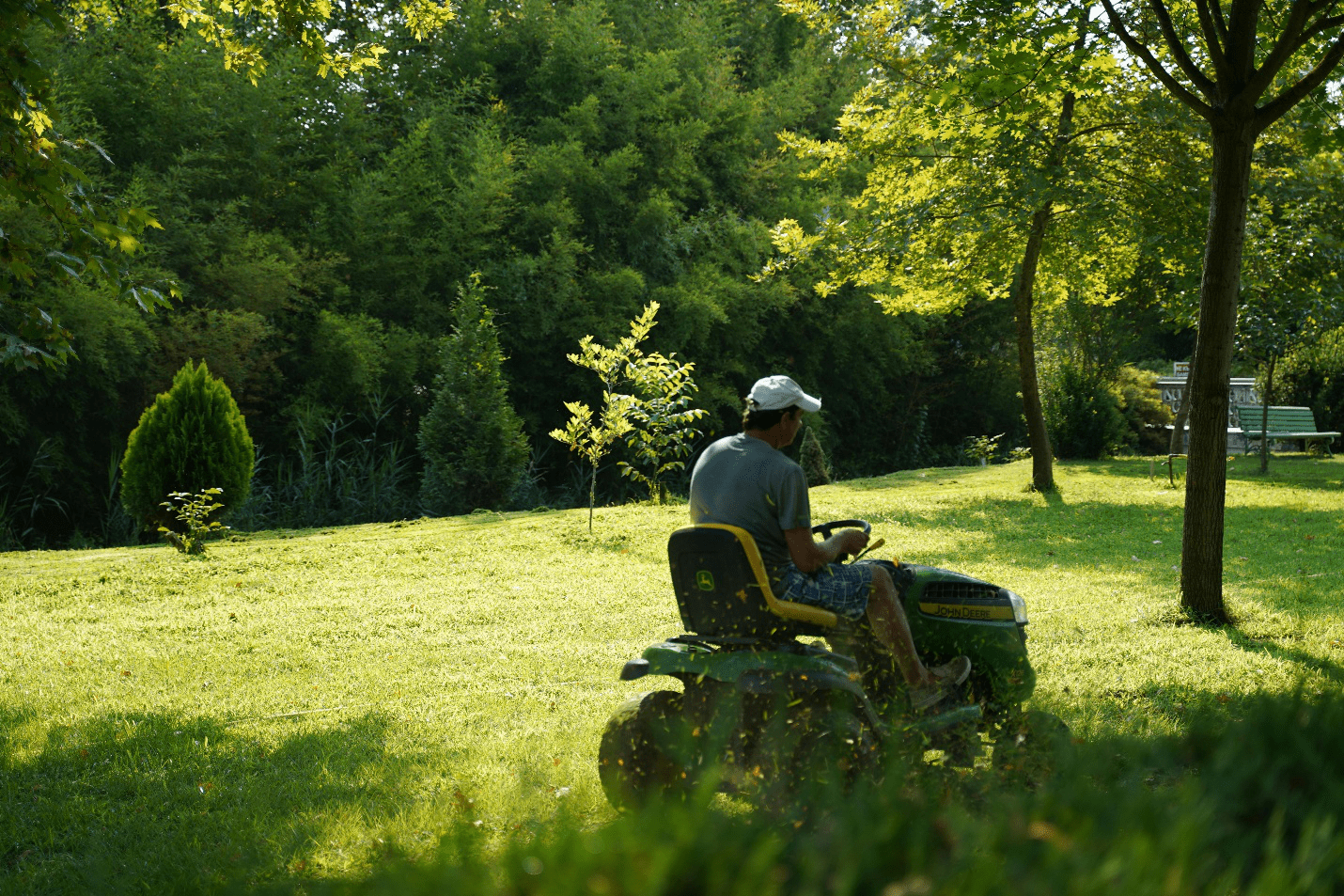 Person mowing lawn