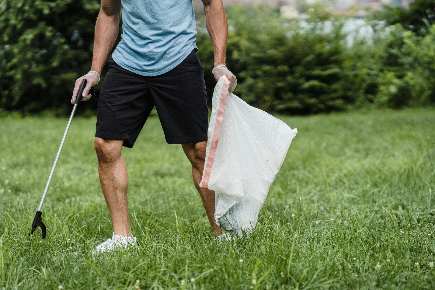 Person maintaining lawn